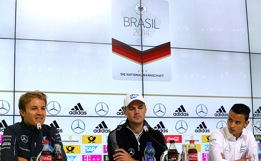  Formula 1 driver Nico Rosberg of Germany, golf professional Martin Kaymer of Germany and DTM driver Pascal Wehrlein of Germany talk to the media during the German National team press conference