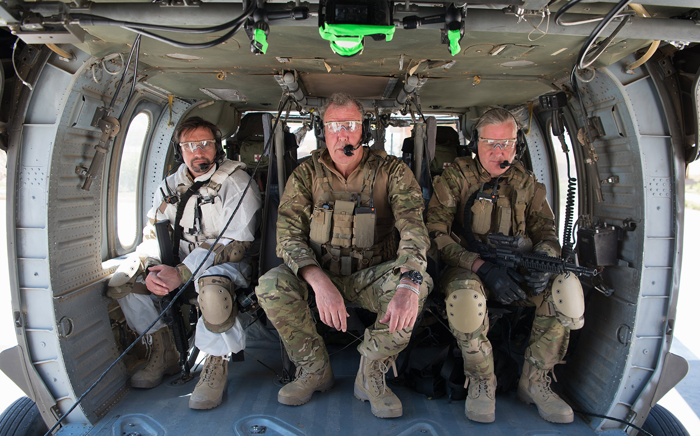 TRIGGER POINT Taking to the air at a special forces facility in Jordan, top, while, right, it’s all downhill for Clarkson