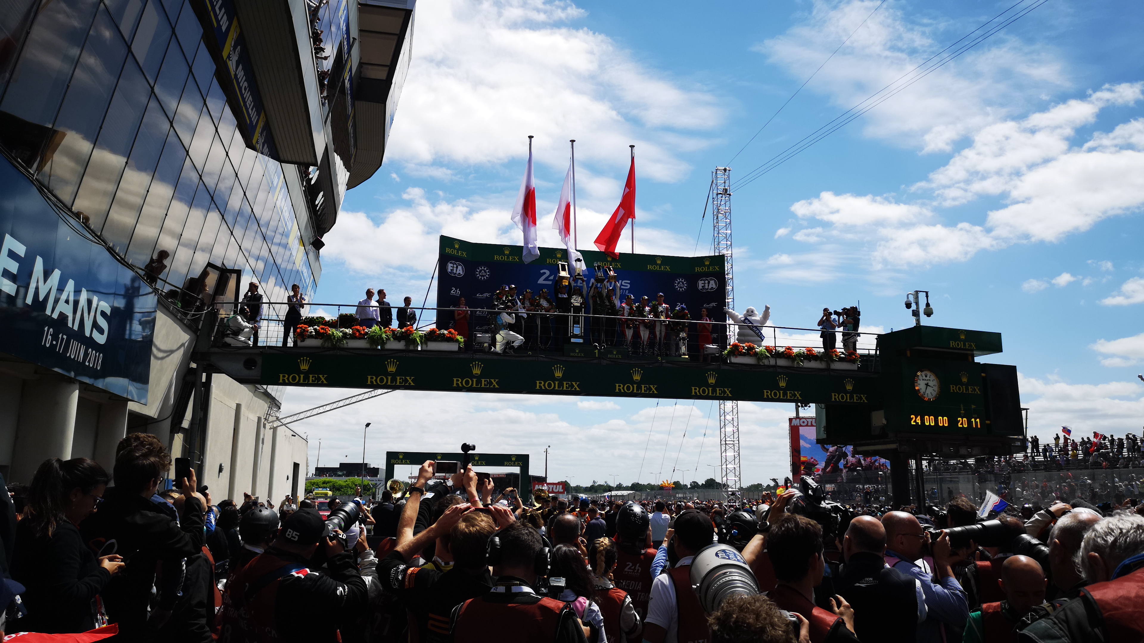 2018 Le Mans 24 Hours - post-race atmosphere in pitlane and podium - Fernando Alonso, Kajuki Nakajima, Sebastien Buemi