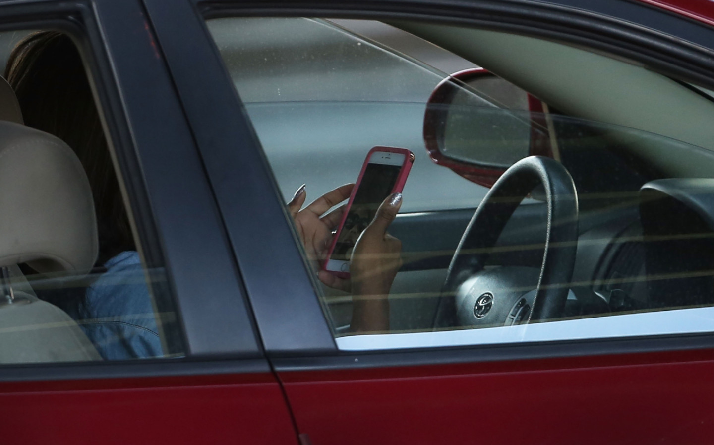 One in five young drivers video call behind the wheel