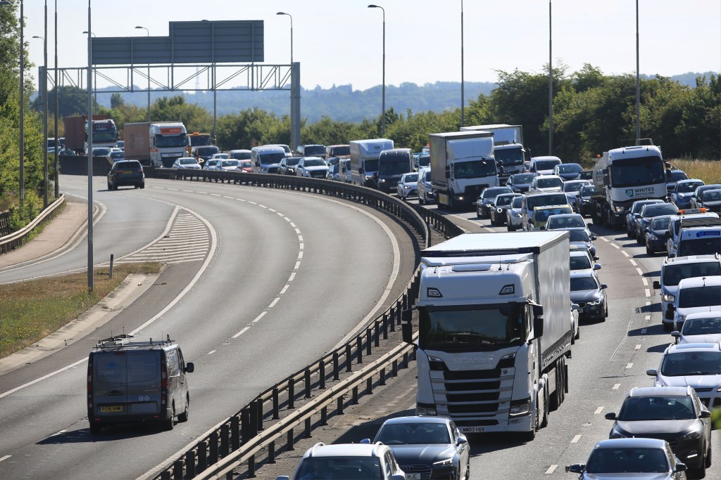 The southbound A12 experiences miles of traffic congestion as fuel protesters drive at up to 20 miles an hour at the front of a rolling blockade on July 4, 2022 in Hatfield Peverel, United Kingdom. Prices for petrol and diesel have risen steadily this year as the price of oil has climbed, due to post-pandemic demand and sanctions against Russia, one of the world's largest oil exporters. (Photo by Martin Pope/Getty Images)