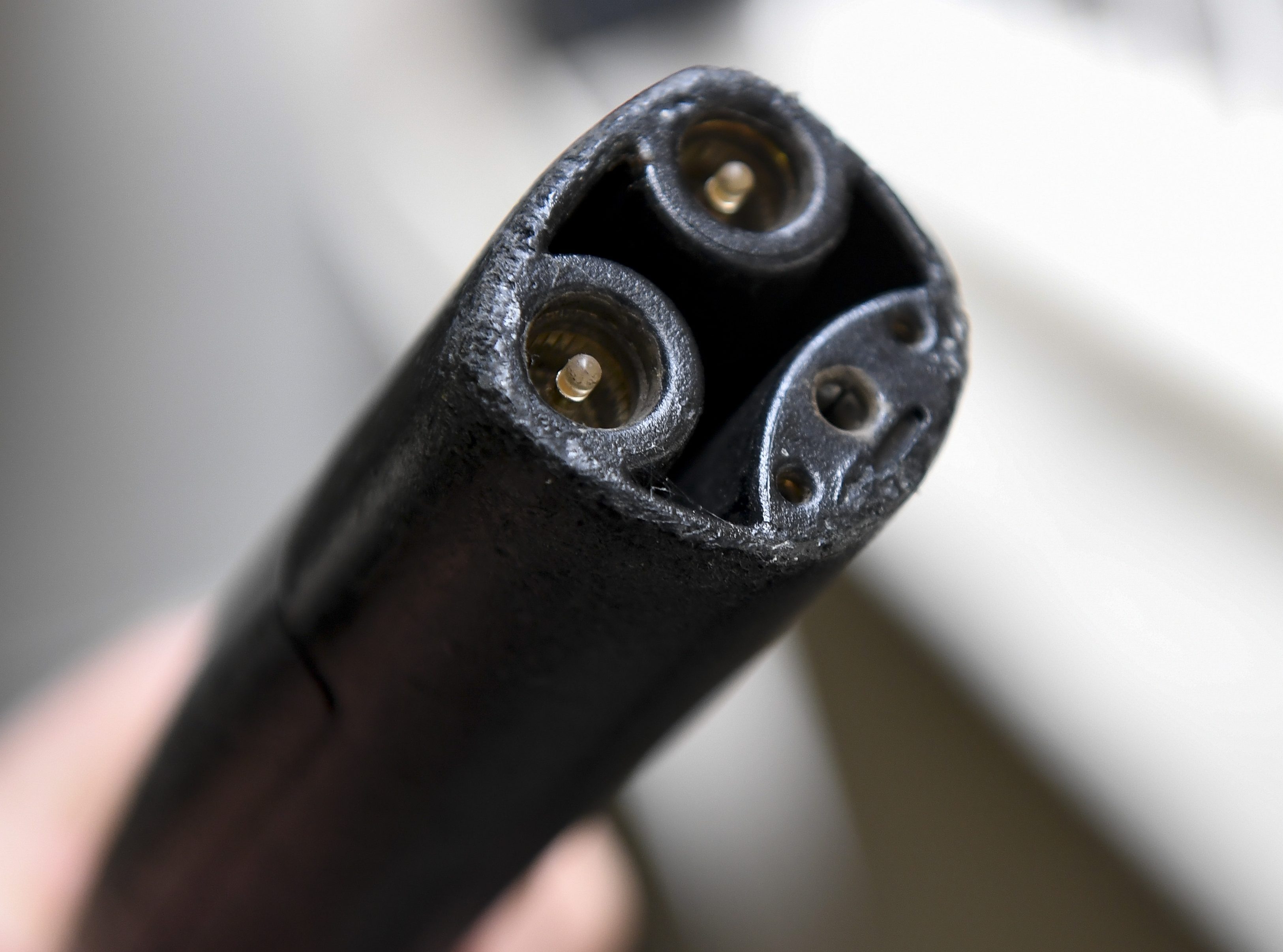 Reading, PA - July 21: The plug for charging a Tesla at a Tesla electric vehicle (EV) charging station in the parking garage at the DoubleTree by Hilton Hotel in Reading, PA Wednesday morning July 21, 2021. (Photo by Ben Hasty/MediaNews Group/Reading Eagle via Getty Images)