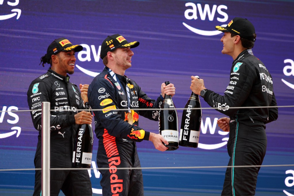 BARCELONA, SPAIN - JUNE 04: Race Winner Max Verstappen of the Netherlands and Oracle Red Bull Racing, Second placed Lewis Hamilton of Great Britain and Mercedes and Third placed George Russell of Great Britain driving the (63) Mercedes AMG Petronas F1 Team W14 celebrate on the podium during the F1 Grand Prix of Spain at Circuit de Barcelona-Catalunya on June 04, 2023 in Barcelona, Spain. (Photo by Adam Pretty/Getty Images)