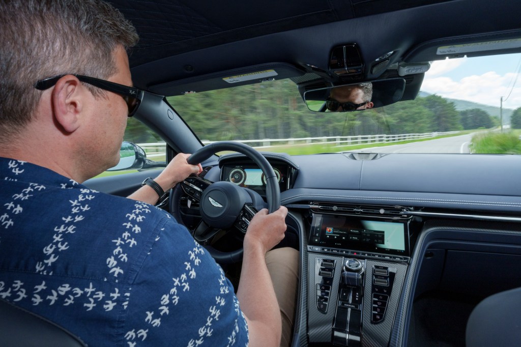 Will Dron driving the Aston Martin DB12