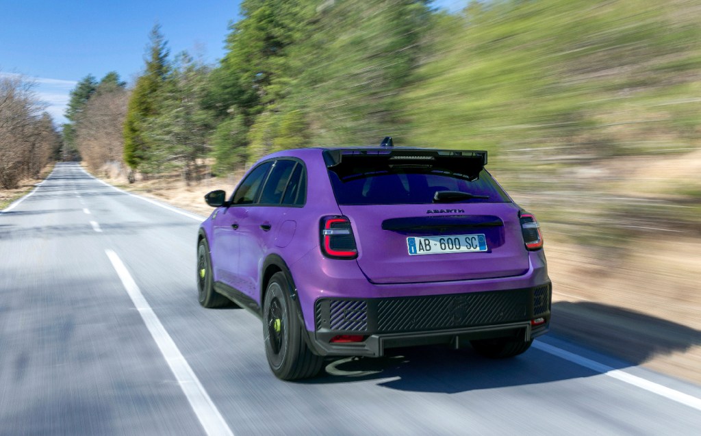 Abarth 600e rear 3/4 action view